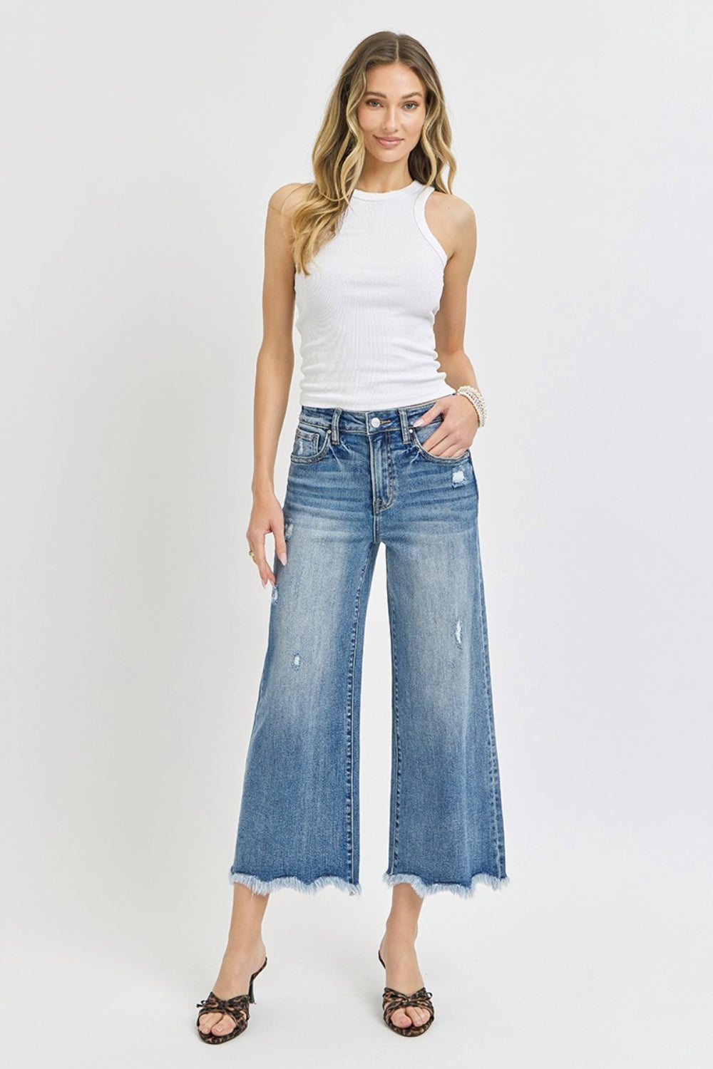 Risen High Rise Raw Hem Cropped Flare Jeans